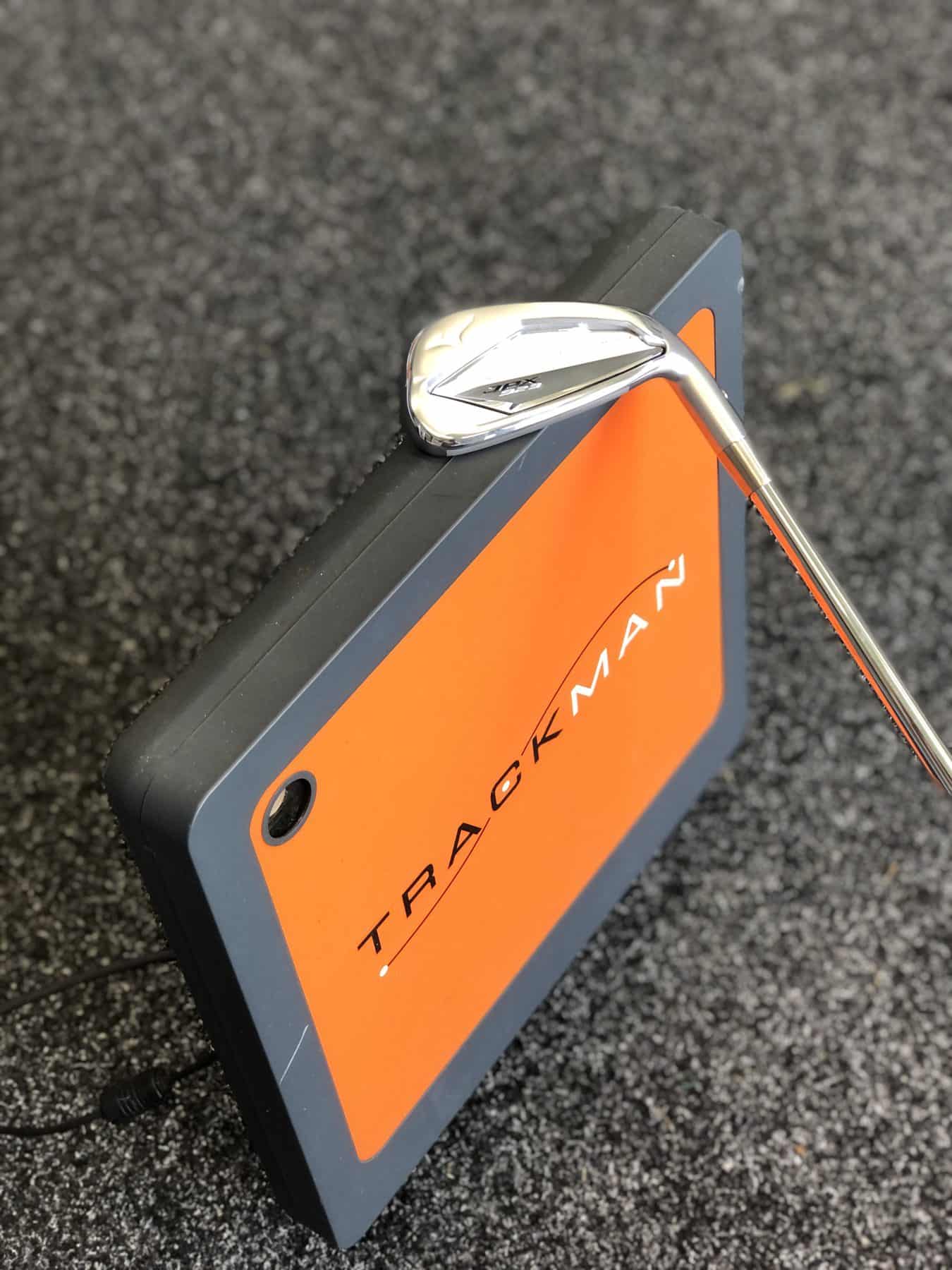 TrackMan unit behind the hitting area